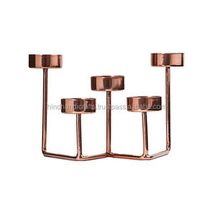 Nouveau design de candélabre en cire parfumée 4 Lite plaqué cuivre pour la décoration de la maison et de l'hôtel de mariage de Noël exporté d'Inde - Product Image 5