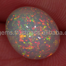 พลอยอัญมณีทรงวงรีทรงโค้งรูปวงรีโอปอลหลวมโอปอลไฟ weo จากธรรมชาติ - Product Image 1