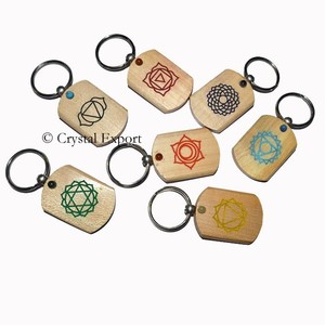 Wholesale of <b>Chakra</b> Keychain - Engraved Color <b>Chakra</b> Symbol <b>Set</b> on Wood with Cabs - Product Image 1