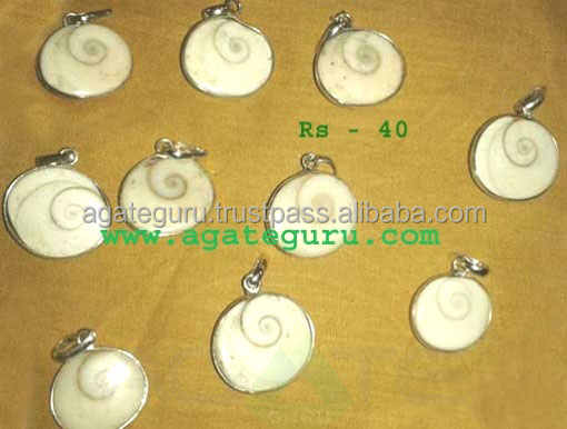 Gomti Chakra Ring Pendants Indu=ian healing gomti chakra pendents