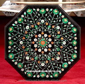 Exclusivo y hermoso tablero de mesa octogonal de color negro con incrustaciones de mármol Pietra Dura para decoración de hoteles y hogares al mejor precio. - Product Image 1