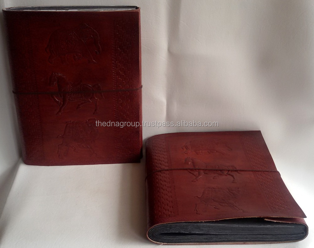 Фотоальбом ручной работы из натуральной тисненой кожи с ремешком