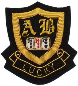 Épaulettes brodées à la main en tissu - Product Image 1