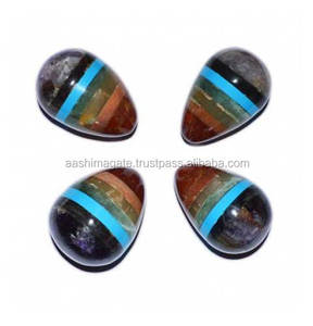 Vente en gros Oeufs de pierres précieuses naturelles 7 Chakra Reiki Faits à la main Cristaux de minéraux sertis de sac d'amour Style mascotte de l'Inde Prix bon marché - Product Image 1