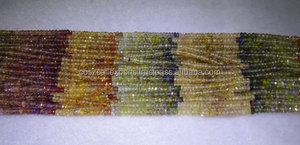 Cuentas Redondas Facetadas de Zirconia Natural Blanca en Múltiples Tonos - Product Image 2