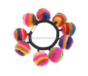 Diadema de lana hecha a mano y monederos Gender-Nu con accesorio y billetera Crazy Ball únicos - Product Image 1