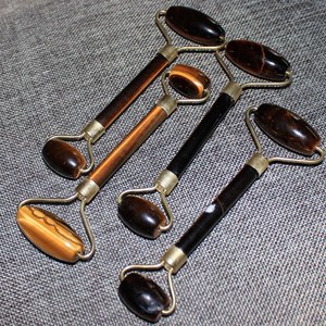 High quality <b>massage</b> <b>roller</b> tiger eye stone face <b>Massage</b> natural crystal <b>roller</b> facial products <b>roller</b> 4 to 5 Inch wholesaler - Product Image 3