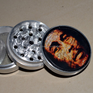 Broyeur à herbes, café et tabac magnétique en titane fait main, 4 pièces, Magic Bob Marley - Product Image 1