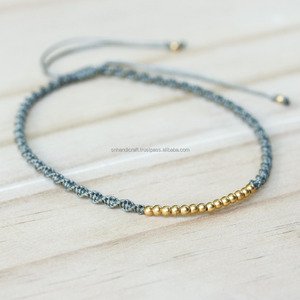 Adjustable Friendship Bracelet Cotton <b>String</b> in Twist Design and <b>Gold</b> Plated on Sterling Silver Beads at the Center - Product Image 1