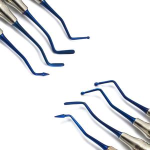 Juego de 4 instrumentos de llenado compuesto dental manual con punta azul Cassette de acero inoxidable Equipo de limpieza y llenado de dientes - Product Image 4