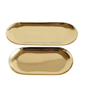 Lot de 2 petits plateaux de service en métal doré - Product Image 1