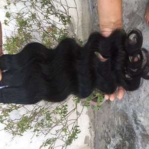 South Indian Raw Remi Temple Ondulado Doble Wefted Hair Single Drawn Sin procesar Virgen cruda 20 "Temple Cabello humano a precios de fábrica - Product Image 4