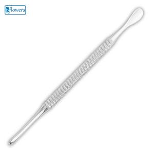 Poussoir à cuticules à double extrémité en acier inoxydable - Product Image 1