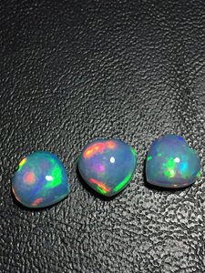 Vente en gros AAA haute qualité IGI certifié pierre précieuse opale éthiopienne 6mm Cabochon coeur de feu naturel traité thermiquement pierres précieuses en vrac - Product Image 2