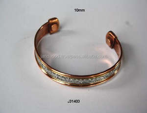 Pulsera magnética de cobre de dos tonos con patrón floral, brazalete de acero con diseño floral que tiene beneficios para la salud - Product Image 2