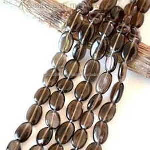 Cuentas de piedra sueltas ovaladas lisas de piedras preciosas marrones de cuarzo ahumado - Product Image 1