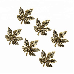 Anillo de metal con forma de hoja hecho a mano para hotel, servilletas, estilo occidental, creativo, a la moda, con plumas doradas - Product Image 1