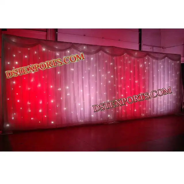 結婚式の照明付きの美しいステージの背景結婚式の背景カーテンの背景結婚式のドレープ