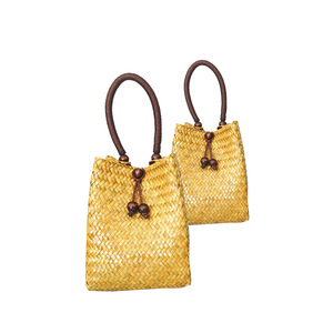 Sacs à main en bambou écologique jaune faits à la main en Thaïlande - Product Image 1