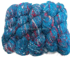 multicolored sari silk yarn in beautiful bright blue color available in 100 gram skeins made from recycled sari fiber