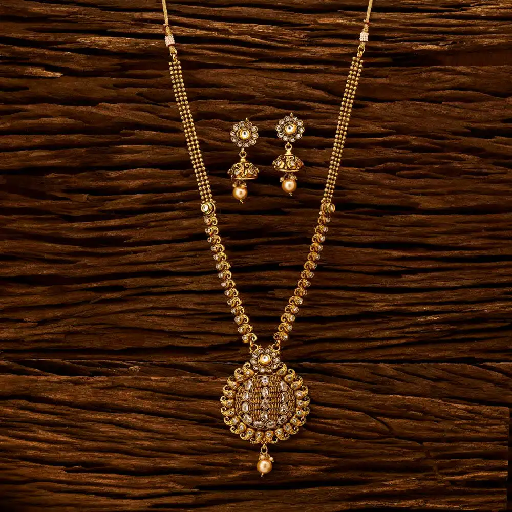 Wholesale of Antique Gold Plated Long Necklace Set White 15509 Fashion Necklace sets in Indian Jewellery
