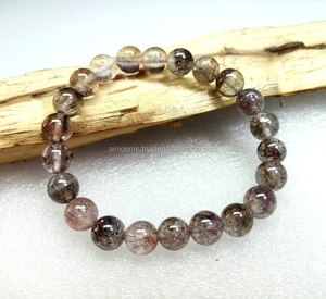 Pulsera Super Seven Gemstone Balls Lepidocrocite, Cacoxenite Smooth Super Seven Cabochon Balls a precio mayorista - Product Image 1