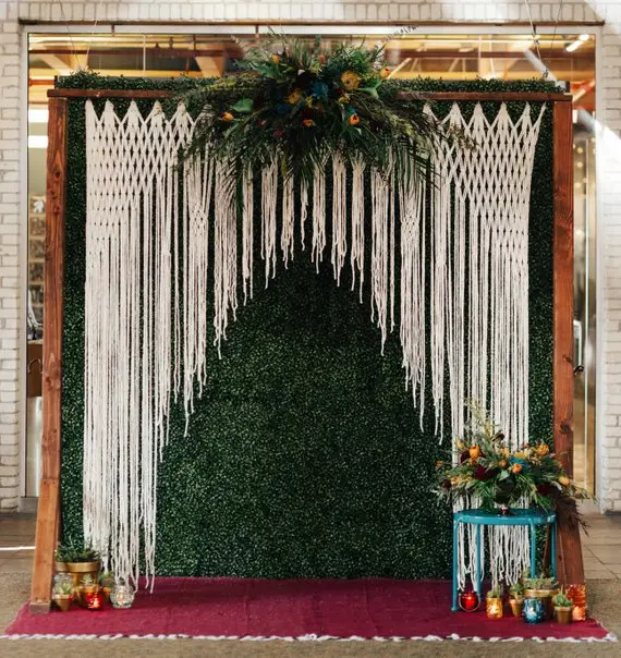 Luxurious handcrafted large macrame hanging wedding backdrop