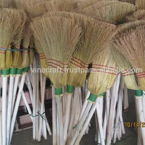 Long sorghum broom with wood handle