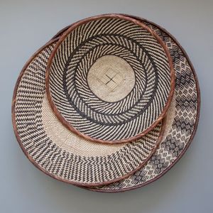 Cesta de decoración de arte de pared de ratán redonda hecha a mano de alta calidad estilo de pueblo Popular barato al por mayor para decoración del hogar - Product Image 1