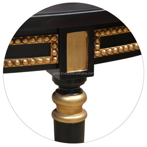 Table basse ronde sculptée à la main, couleur noire, combinée à du doré - Product Image 3