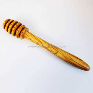 Cuchara de miel de madera de olivo tunecino de 14 cm, producto de vajilla elegante - Product Image 1