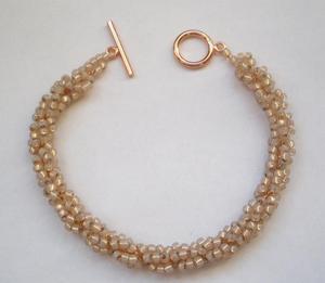 High Quality Pearly Peach Spiral <b>Bracelet</b> - Product Image 1