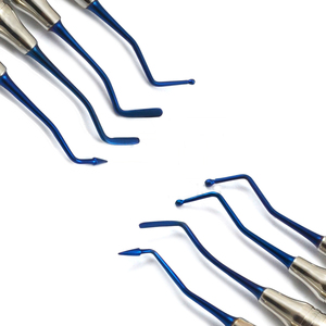 Juego de 4 instrumentos de llenado compuesto dental manual con punta azul Cassette de acero inoxidable Equipo de limpieza y llenado de dientes - Product Image 6