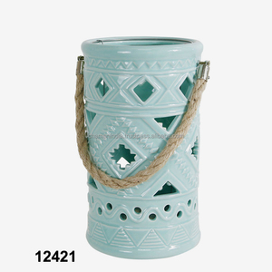 Linterna de vela sin llama de flor de cerámica - Product Image 1