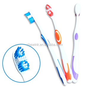 Brosse à dents adulte à poils souples avec motif arrondi pour usage domestique - Product Image 1