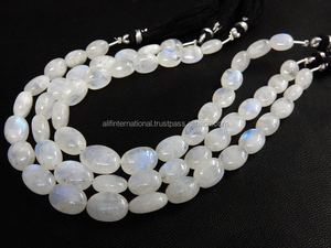 Perles de pierre de lune arc-en-ciel bleu naturel AAA en vrac lisses en gros perles ovales pour l'utilisation de bijoux - Product Image 2