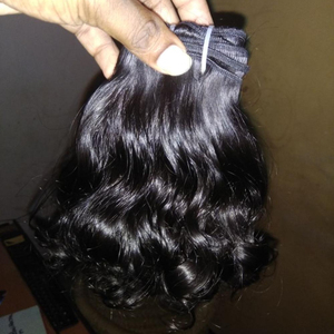 Cabello humano Remy de textura rizada suelta, cabello Remy más vendido. Máquina de tejido de cabello humano virgen de doble trama de la India - Product Image 2