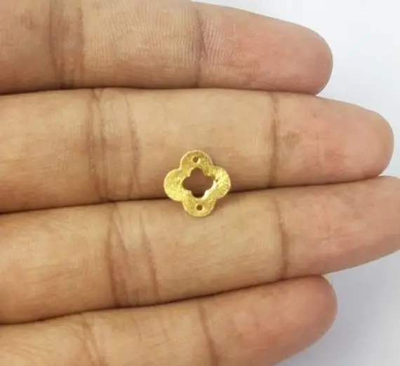 مكونات مجوهرات مطلية بالذهب على شكل ورقة البرسيم