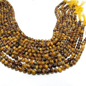 Cuentas de piedras preciosas lisas de forma redonda de ojo de tigre Fabricación de joyas Calidad increíble natural - Product Image 1