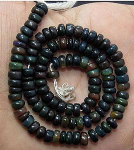Perles de pierres précieuses en vrac en forme de rondelle lisse d'opale noire éthiopienne naturelle de haute qualité pour la fabrication de bijoux - Product Image 1