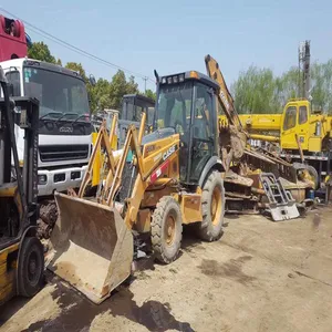 Tracteur compact, mallette d'occasion modèle 580, avec chargeur et tractopelle