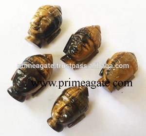 Cabezas de Buda de ojo de tigre talladas a mano al por mayor, estatua de Buda India y Tailandia a la venta - Product Image 1