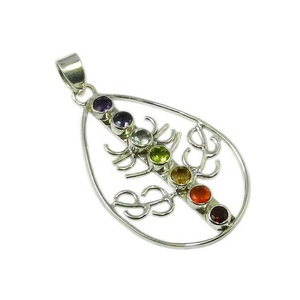 Pendentif Chakra en argent sterling 925 avec topaze bleue et pierres précieuses faites à la main Pendentifs et breloques de bijouterie fine - Product Image 1