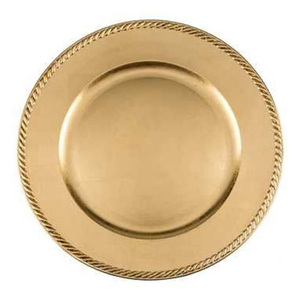 แผ่นรองจานสีทองบนโต๊ะ - Product Image 1