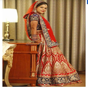 Zari Work Diseño nupcial tradicional Lehenga Choli en poliéster de seda cruda de alta calidad para ocasiones de boda y fiesta - Product Image 1