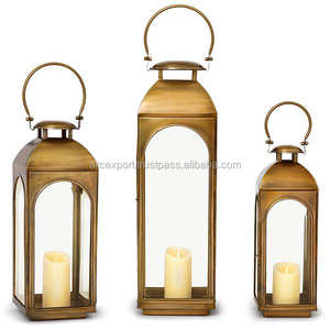 Juego de 3 farolillos de color dorado, mesa relámpago y decoración colgante, farol colgante hecho de vidrio y farol de metal a la venta - Product Image 1