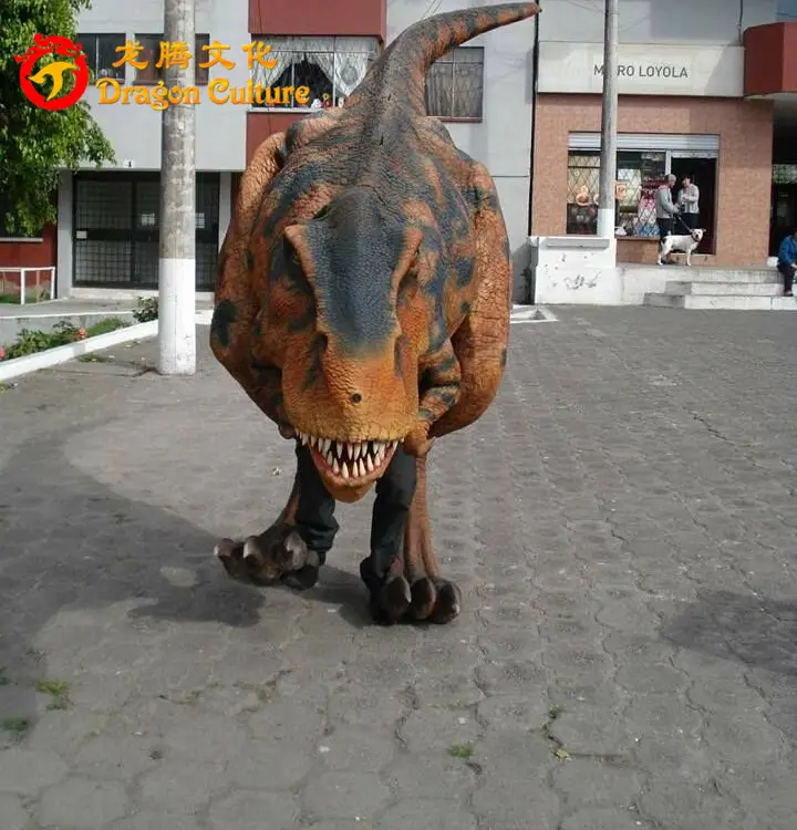 A piedi Con Dinosauro Costume Per Lo Spettacolo Dinosauro Del Costume Della Mascotte