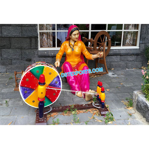 Estatua de fibra de dama Punjabi con charkha, estatua de fibra de cultura Punjabi en venta, estatua de boda india para decoración de entrada - Product Image 1