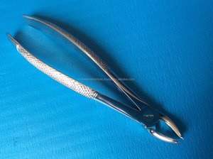 Instruments dentaires manuels en acier inoxydable à motif anglais 18 pinces d'extraction de la figue a pour l'extraction des dents en acier inoxydable massif - Product Image 3