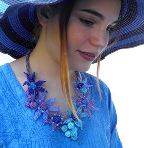 Iridescent Shades of Blue and Purple Form this Colorful Romantic Flowers and Berries Bib Necklace - Product Image 1